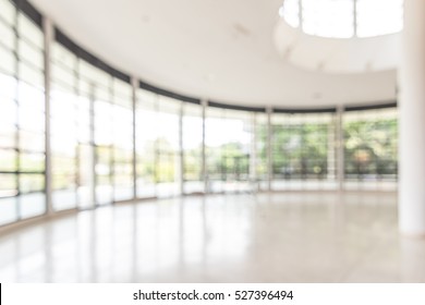 Blur Business Office Background Empty White Room Lobby Hall Interior With Glass Wall Window And Blurry Light Bokeh 