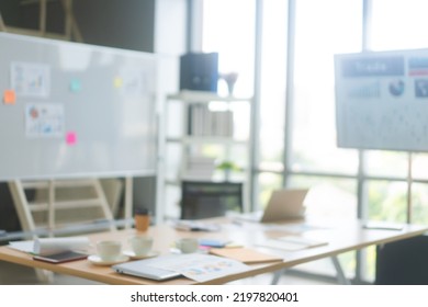 Blur Of Business Office Boardoom Background. Busy Workplace Table After Meeting No People.