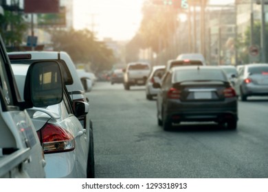 Blur Cars On The Road With Smooth Traffic At Junction Area. Cars Stop Beside Road And Light.