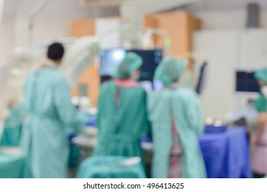 Blur Cath Lab in modern hospital with doctor, nurse and patient.