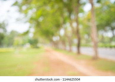 Blur of city park bokeh background in summer, green nature concept - Shutterstock ID 1144625504