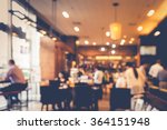 Blur coffee shop  or cafe restaurant with abstract bokeh light image background.For montage product display or design key visual layout