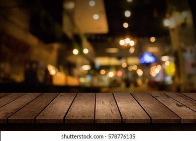 Blur coffee shop or cafe restaurant with abstract bokeh light background. For create montage product display