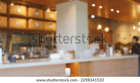 Photo of Blur coffee shop or cafe restaurant with abstract bokeh light image background. People in store Blur Background or design key visual layout