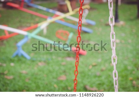 Blur colorful playground in nature green park abstract background. Copy space of sport exercise and health care concept. Vintage tone filter effect color style.