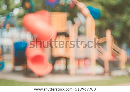 Blur colorful playground in nature green park abstract background. Copy space of sport exercise and health care concept. Vintage tone filter color style.