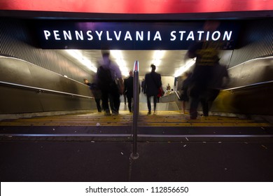 Blur Of Commuters Rushing Down The Steps To Pennsylvania Station Subway In New York City