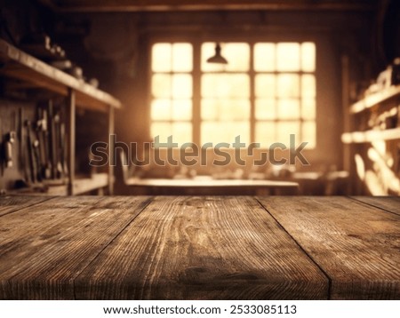 Blur craft workshop interior and empty wooden table top with space for products.