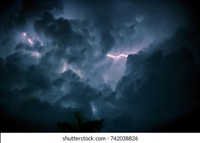 Blur Dark Sky And Cloud Storm With Lightning Before Rain.