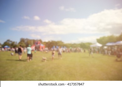 Blur Defocused Background Of People, Family In Park Fair, Fun Festive Summer Festival 