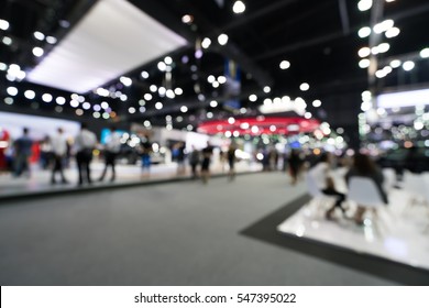 Blur, defocused background of public exhibition hall. Business tradeshow, job fair, or stock market. Organization or company event, commercial trading, or shopping mall marketing advertisement concept