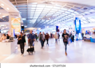 Blur Of Duty Free Shop At Airport With Passengers Are Walking Shopping