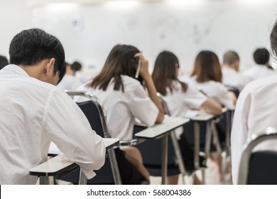 Blur Education Background University Or College Students Having Exam In School Class Room