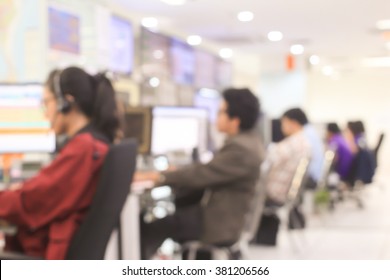 blur employee work as call centre talking with customer at operation monitor room concept.