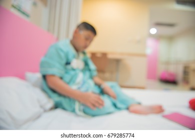 Blur Focus Of Asian Boy In Hospital Wearing Sleep Apnea Diagnostic Medical Device Kit. Sleep Lab Test.