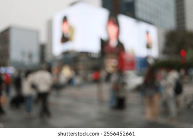 Blur focus of Busy intersection is crowded with people.