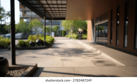 Blur focus of empty long corridor in the modern office building.
