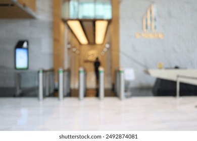 Blur focus of Entrance Gate Access Touch technology security system in a office building.Electronic Entrance gate card People pass Access Building Security system. access control system of the office
