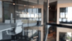 Blur Focus Of Fashion And Modern Office Interiors. Front View Of A Loft Open Space Office Interior. Blur Background.