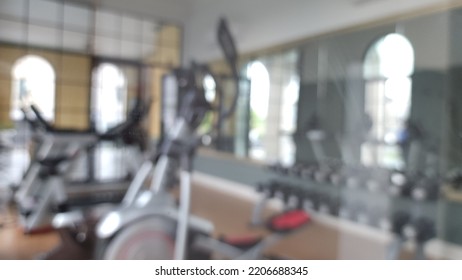 Blur Focus Of Fitness Room Background.