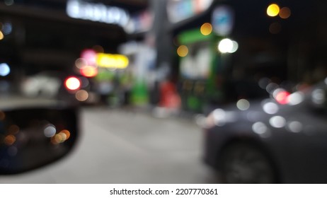 Blur Focus Of Gas Station Background.interior Car In Gas Station.