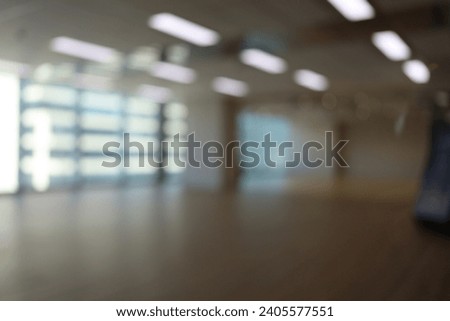 Blur focus of glass wall from building in city town background.