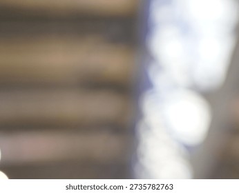 Blur focus of Looking up at a ceiling with skylights in terminal.