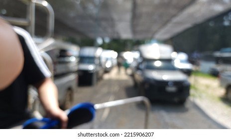 Blur Focus Of Parking Area At The Waiting Area For Passengers Until The Next Car Arrives.