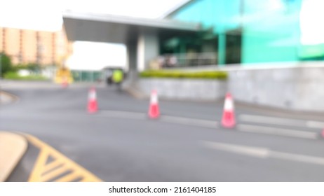 Blur Focus Of The Parking Lot Near The Hospital Building