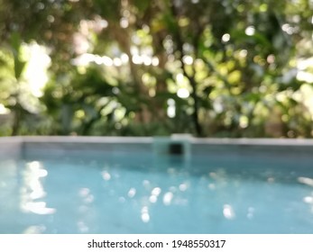 Blur Focus Of Pool In Back Yard Modern House.blur Focus Of Balcony Backgound.