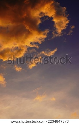 Blur focus Sunset sky yellow clouds on a blue sky  background                  