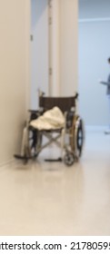 Blur Focus Of An Wheelchair In A Hospital Is Parked. No People.