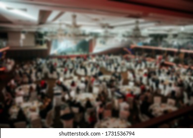 Blur Of The Gala Dinner, Business Conference And Presentation. People At The Conference Hall