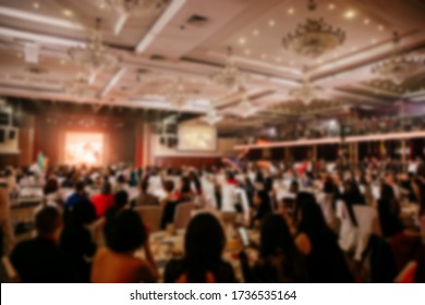 Blur of the gala dinner, business conference, training, coaching and presentation. People at the conference hall