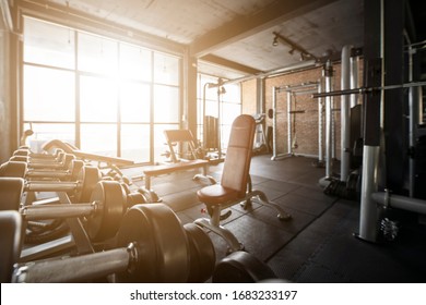 Blur Gym Background Concept With Workout Weight Equipment In Fitness