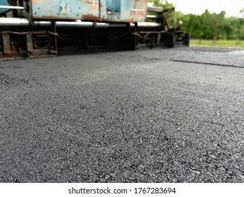 Blur image, asphalt paving With heavy machinery in Thailand
