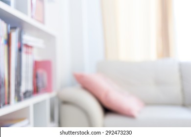 Blur Image Background, Book Shelf And Sofa Furniture Interior Decoration In Home