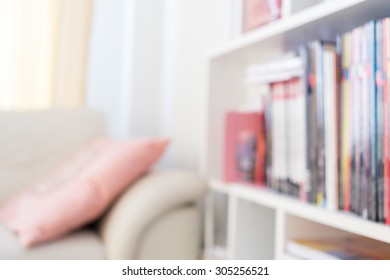 Blur Image Background, Book Shelf And Sofa Furniture Interior Decoration In Home