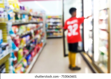 Blur Image Of A Boy Buys A Snack In A Convenience Store.