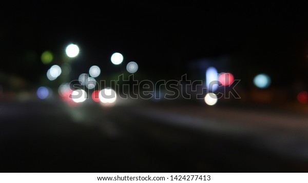 blur image of city at
night.blurred urban abstract traffic background. blur, bokeh,
street, traffic , car