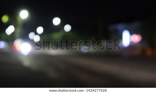 blur image of city at\
night.blurred urban abstract traffic background. blur, bokeh,\
street, traffic , car