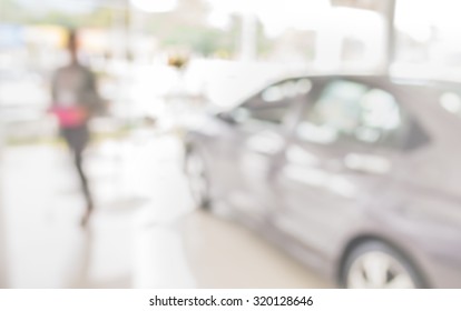 Blur Image Of Commercially Cars Stand In Show Room Of Car Shop.