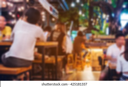 Blur Image Of Crowded Traveler In Pub At Thailand,vintage Tone