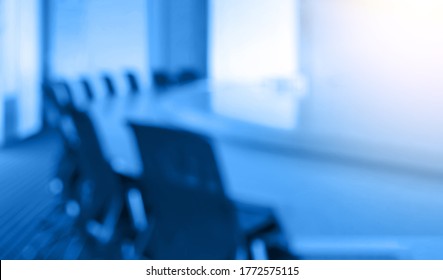 Blur Image Of Empty Boardroom  Background In Blue Tone. Business Concept