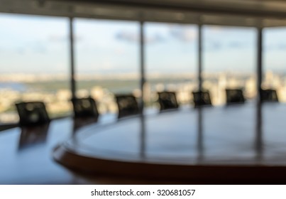 Blur Image Of Empty Boardroom With Window Cityscape Background. Business Concept