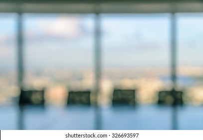 Blur Image Of Empty Boardroom With Window Cityscape Background. Business Concept