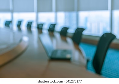 Blur Image Of Empty Boardroom With Window Cityscape Background. Business Concept