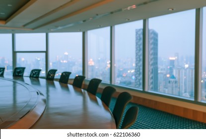 Blur Image Of Empty Boardroom With Window Cityscape Background. Business Concept