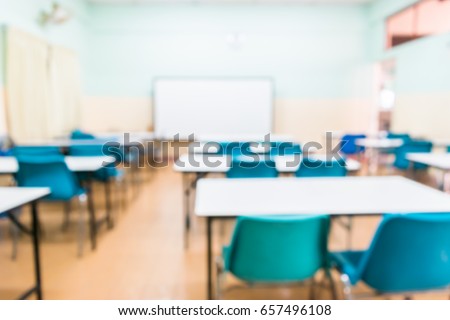 Blur image of empty classroom.