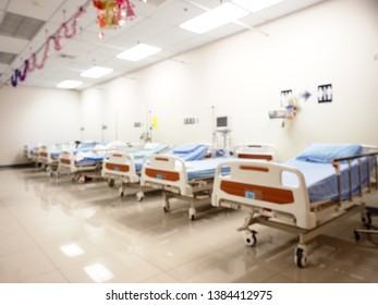 Blur image of Empty intensive care bed in emergency room, Abstract blur of Hospital patient ward or ICU intensive care unit, Hospital concept.